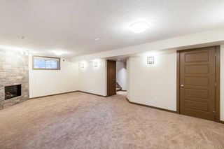 Photo 19: 28 Cougar Ridge Link SW in Calgary: Cougar Ridge Detached for sale : MLS®# A2121647
