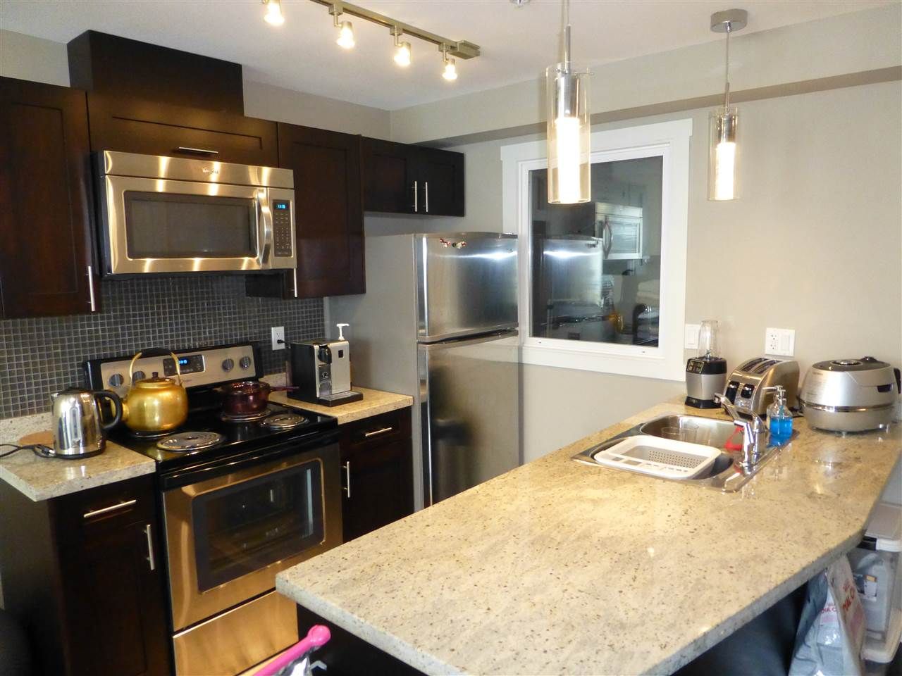 Main Photo: 306 5488 CECIL Street in Vancouver: Collingwood VE Condo for sale in "Cecil Hill" (Vancouver East)  : MLS®# R2142569