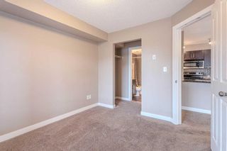 Photo 9: 211 403 Mackenzie Way SW: Airdrie Apartment for sale : MLS®# A2125740