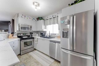 Photo 7: 8429 304 Mackenzie Way SW: Airdrie Apartment for sale : MLS®# A2125432