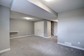 Photo 34: 1804 Evanston Square NW in Calgary: Evanston Row/Townhouse for sale : MLS®# A1218972