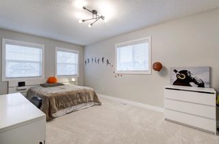 Photo 17: 178 Cougar Plateau Way SW in Calgary: Cougar Ridge Detached for sale : MLS®# A1173692