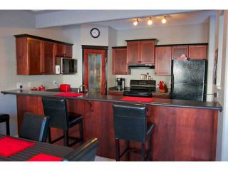 Photo 6: 24 ROCKY VISTA Terrace NW in CALGARY: Rocky Ridge Ranch Residential Attached for sale (Calgary)  : MLS®# C3509199