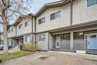 Photo 1: 46 7172 Coach Hill Road SW in Calgary: Coach Hill Row/Townhouse for sale : MLS®# A1210652