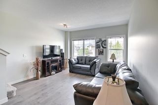 Photo 25: 2103 Jumping Pound Common: Cochrane Row/Townhouse for sale : MLS®# A1170948