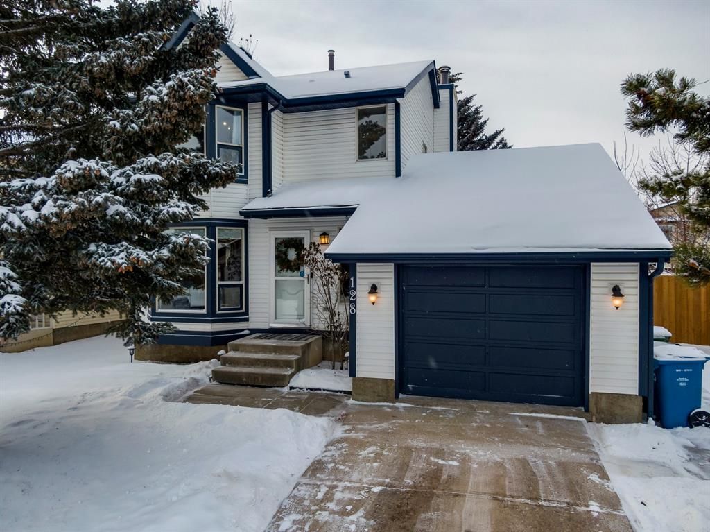 Main Photo: 128 Woodridge Drive SW in Calgary: Woodlands Detached for sale : MLS®# A2014990
