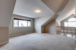 Photo 18: 78 100 Signature Way SW in Calgary: Signal Hill Semi Detached (Half Duplex) for sale : MLS®# A2106888