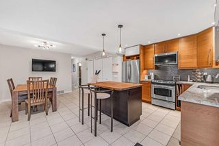 Photo 4: 242 22 Avenue NW in Calgary: Tuxedo Park Detached for sale : MLS®# A2099867
