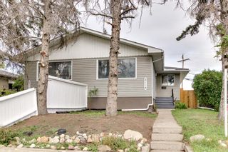 Photo 1: 3114 14 Street NW in Calgary: Rosemont Semi Detached for sale : MLS®# A1137310