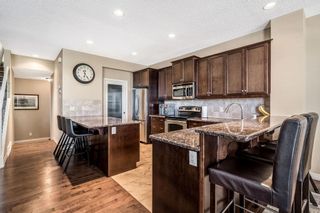 Photo 7: 110 Autumn Circle SE in Calgary: Auburn Bay Detached for sale : MLS®# A2051772