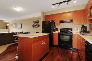 Photo 4: 301 5465 203RD Street in Langley: Langley City Condo for sale in "STATION 54" : MLS®# F1436316