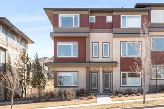 Photo 1: 104 501 River Heights Drive: Cochrane Row/Townhouse for sale : MLS®# A1204085
