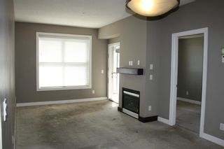 Photo 5: 413 88 Arbour Lake Road NW in Calgary: Arbour Lake Apartment for sale : MLS®# A1219244
