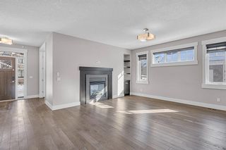 Photo 9: 21 Murmansk Way SW in Calgary: Currie Barracks Detached for sale : MLS®# A2029100