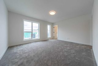 Photo 13: 322 Sovereign Common SW in Calgary: Shaganappi Row/Townhouse for sale : MLS®# A2127197