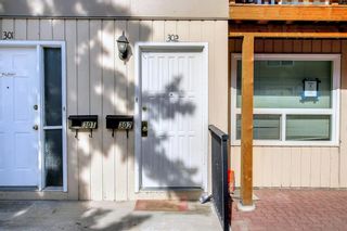 Photo 3: 302 219 Huntington Park Bay NW in Calgary: Huntington Hills Row/Townhouse for sale : MLS®# A1187691