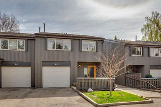 Photo 1: 14 2225 Oakmoor Drive SW in Calgary: Palliser Row/Townhouse for sale : MLS®# A2129148