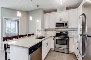 Photo 7: 1407 522 Cranford Drive SE in Calgary: Cranston Apartment for sale : MLS®# A1211063