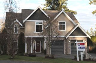 Photo 1: 4673 204A Street in Langley: Langley City House for sale in "Mossey Estates" : MLS®# R2022595