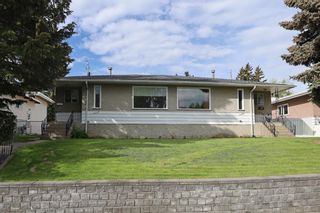 Photo 1: 1427 & 1429 Rosehill Drive NW in Calgary: Rosemont Full Duplex for sale : MLS®# A1253117
