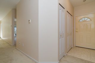Photo 29: 210 20680 56TH Avenue in Langley: Langley City Condo for sale in "CASSOLA COURT" : MLS®# F1422247