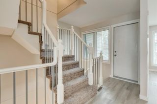Photo 15: 109 Coachway Lane SW in Calgary: Coach Hill Row/Townhouse for sale : MLS®# A1158669