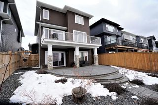 Photo 4: 213 Crestmont Drive SW in Calgary: Crestmont Detached for sale : MLS®# A2041791