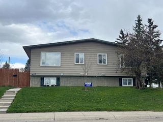 Main Photo: 424 60 Avenue NE in Calgary: Thorncliffe Full Duplex for sale : MLS®# A2128995