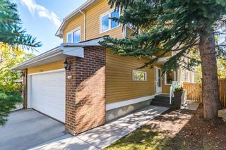 Photo 2: 49 Stradwick Place SW in Calgary: Strathcona Park Semi Detached (Half Duplex) for sale : MLS®# A2082452