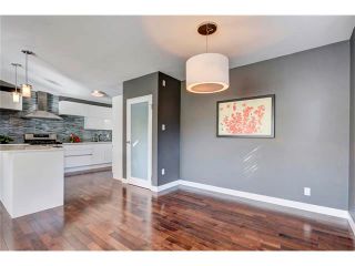 Photo 14: 5612 LADBROOKE Drive SW in Calgary: Lakeview House for sale : MLS®# C4036600