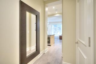 Photo 8: 102 690 Princeton Way SW in Calgary: Eau Claire Apartment for sale : MLS®# A2109245