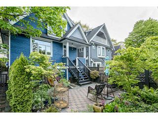 Photo 1: 1809 E 7TH Avenue in Vancouver: Grandview VE 1/2 Duplex for sale (Vancouver East)  : MLS®# V1062864