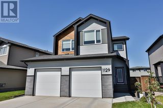Photo 1: 1129 Pacific Circle W in Lethbridge: House for sale : MLS®# A2051479