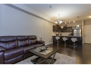 Photo 9: 211 9655 KING GEORGE Boulevard in Surrey: Whalley Condo for sale in "GRUV" (North Surrey)  : MLS®# R2139260