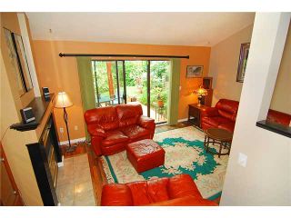 Photo 2: 8580 Woodgrove Place in Burnaby: Forest Hills BN Condo for sale (Burnaby North)  : MLS®# V1003573