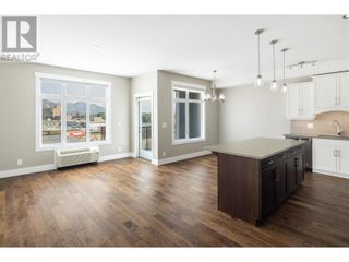 Photo 1: 1165 Sutherland Avenue Unit# 403 in Kelowna: House for sale : MLS®# 10313029