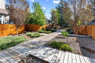 Photo 2: 27 12625 24 Street SW in Calgary: Woodbine Row/Townhouse for sale : MLS®# A2080696